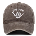 Detailed close-up of Stay Spooky embroidery on brown washed vintage baseball cap - Adjustable / Coffee