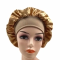 Detail of high-elastic wide-brim golden satin sleep cap on a mannequin head - One Size / Gold