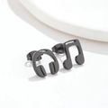 Minimalist black stainless steel music note and headphone stud earrings on white background - Music Note Black
