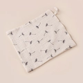Detail view of a cream cotton muslin baby washcloth with dandelion print and loop - 23x23cm / Beige Dandelion