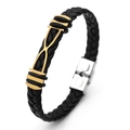 Detail of woven black leather bracelet featuring gold hourglass accent and maple leaf pattern - Hourglass
