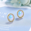 Elegant gold opal stud earrings for women with oval halo zircon setting in a minimalist style - Gold