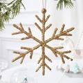 Sparkling gold snowflake Christmas ornament with glitter finish hanging on pine branch - 16CM Large Snowflake / Champagne