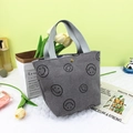 Détail du sac à main en velours côtelé gris avec motifs sourires et bouton pression - Visage Souriant Gris