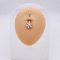 Silver snowflake belly button ring with clear cubic zirconia on silicone navel model - Silver Snowflake