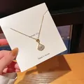 Elegant gold fan pendant necklace with micro-pave diamonds and central pearl detail - Gold (Fan Pearl Rhinestone)