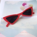 Retro red triangular cat-eye sunglasses for kids with black lenses and glossy finish - Red