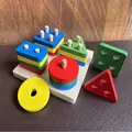 Colorful geometric wooden sorter blocks with natural base for toddler development - MBB Four-Column Shape Sorter