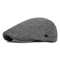 Grey herringbone tweed newsboy cap with adjustable bronze buckle on the side profile - Light Gray