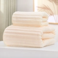 Creamy white coral fleece towel set with thick ribbed texture on minimalist pedestal - Towel (35*75cm) / Candy Velvet Series (White)