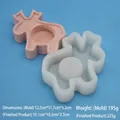 Stampo in silicone per alce di Natale e prodotto finito rosa su sfondo azzurro - Cervo 195g
