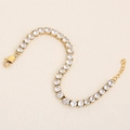 Classic 18K gold plated tennis bracelet featuring sparkling round clear zirconia stones - Gold-White / Bracelet