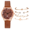 Close-up of rabbit dial watch set with rose gold knot and love bracelets and cactus jewelry - Watch and Bracelet / Brown