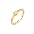 Macro detail of gold adjustable ring with four-prong set cubic zirconia and side pave stones - Adjustable Open / Gold White Zirconia