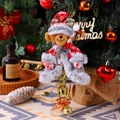 Close-up of teddy bear Christmas ornament with red plaid hat and golden bell - Bear Style