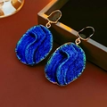 Vintage irregular drop earrings with deep blue crystal and gold trim on leather background - Silver Needle - Iridescent