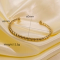 Luxurious 14k gold-plated titanium steel open bracelet with twisted texture and spherical ends - 8010-Twisted Texture Double Ball Style