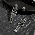 Detailed close-up of vintage silver skull earrings and skeleton pendant set with aged finish - Antique Silver Skull Stud Earrings Set (4123)