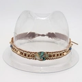 Detail of hand-woven ethnic hat band with turquoise stones and wooden beads on white - One Size / Gravel