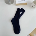 Navy blue ribbed cotton socks featuring a white bunny embroidery in a cozy flat lay setting - One Size / Royal Blue