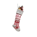 Knitted red and grey Christmas stocking with snowflake patterns and festive pinecone fillers - Snowflake