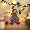 Christmas bear plush pendant with red snowflake button and festive plaid hat on a tree - Button Bear