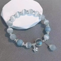 Elegant beaded bracelet with blue cat eye stones and a silver star pendant charm - S158 - Star Cat's Eye Stone Bracelet #sz147