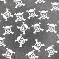 White skull and crossbones confetti decorations scattered on a dark textured background - Skull Head / 100pcs Pack / White
