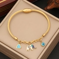 Gold twist rope bracelet with elephant, heart, and blue evil eye charms on jewelry box - Elephant Heart Evil Eye Style(1#)