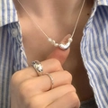 Minimalist silver heart necklace and pearl set with matching rings on blue shirt - Pearl Heart Style (XL2790)