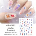 Detail view of jellyfish and seashell nail art stickers on a romantic purple lace background - MS-C192 Jellyfish Dreamland