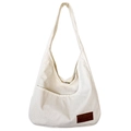 Minimalist beige corduroy hobo tote bag with a small brown leather logo patch - White
