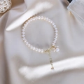 Detail of freshwater pearl bracelet with gold heart extension chain on silk - 23# Cat Claw Freshwater Pearl Bracelet