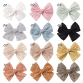 Detailed grid view of hollow lace bow hair clips in 12 assorted colors for girls - 12 Colors Mixed