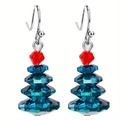 Creative blue crystal Christmas tree earrings with red top and silver hooks on white background - Blue