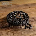 Chauffe-théière rétro en fonte marron foncé avec motifs ajourés et une poignée latérale - Chauffe-plat Rond 7042