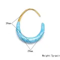 U-shaped earrings with gold plating and blue marble enamel measuring 39mm by 29mm - 39*29mm / Full Coverage / Blue