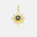Detail of a golden sunburst pendant featuring a central round black gemstone inlay - 18K Gold-Sun