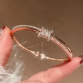 Elegant rose gold teardrop bracelet featuring sparkling clear crystals and knot design - Bracelet-Rose Gold