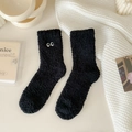 Schwarze Korallenfleece-Socken mit Cartoon-Augenstickerei für warme Wintertage - Einheitsgröße / Schwarz