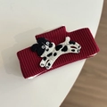 Detail of a dark red knitted headband with a cute cartoon dalmatian dog patch - 14# Wine Red Hair Claw Dog