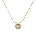 Elegante gouden slangenketting armband met smaragd geslepen zirkoon hanger - Goud met witte zirkonia