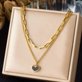 Detail of double-layer gold heart necklace on elegant satin jewelry gift box - Double Layer Chain with Dark Material Heart Style (N4109)