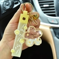 Yellow cherry blossom liquid shaker keychain with lucky silicone wristlet strap charm - Yellow