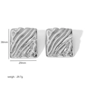 Detail view of silver rectangular earrings with wave texture, 38mm height and 29mm width - 18K Gold / Silver Style (TE6631-S)