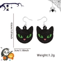 Halloween black cat glitter earrings with green eyes and festive illustrated background - Black Cat Style