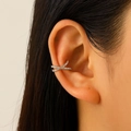 Silver X-shaped ear cuff with sparkling zircon stones worn on the ear cartilage - Gold Cross Rhinestone Style (7643)