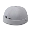 Grey brimless docker hat with black side embroidery and adjustable cotton twill texture - White