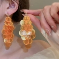 Macro shot of long shell drop earrings in orange-yellow hanging from a model's ear - 37# Silver Pin-Coffee-Small
