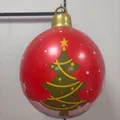 Red inflatable Christmas ball with green tree patterns and a gold hanging ring - Pearly Tree